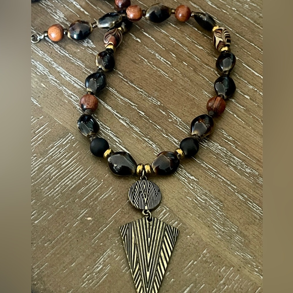 Brown beaded Necklace with gold pendant
